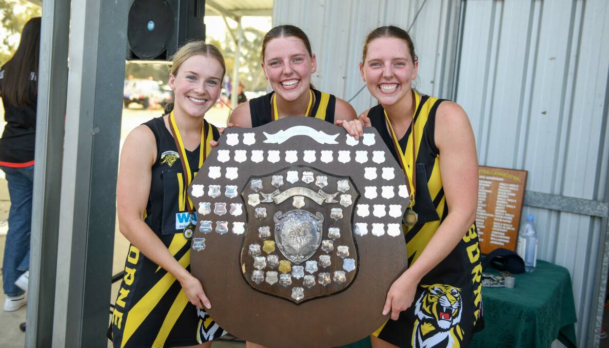 Osborne's Gabrielle O'Connell with her cousins Abbey and Georgia O'Connell following the Tigers' grand final win. Picture by Tara Trewhella