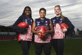 Wodonga Raiders' Tarlina Ganambarr, Courtney Hunt and Tahli Jackson in the club's Indigenous jerseys ahead of Indigenous Round this weekend. Picture by Mark Jesser.