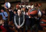Albury-Wodonga Bandit and Trinity Anglican College sports coordinator Jacob Cincurak pictured with excited students ahead of the Bandits' NBL1 East semi-final. Picture by James Wiltshire