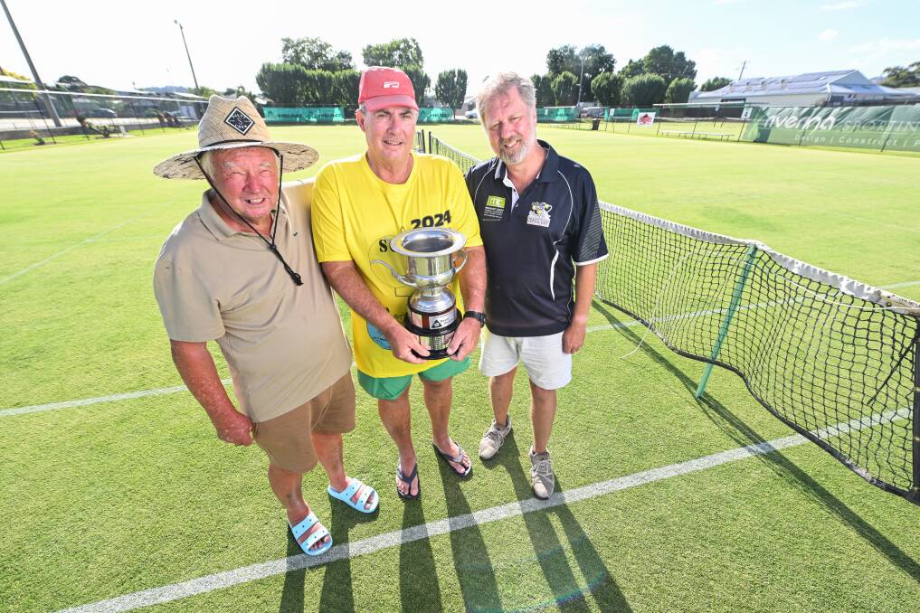 Bill McDonald, David 'Lefty' Wright and Albury's Dom Mahaffey were recognised for their years of service to the Margaret Court Cup during the tournament's opening ceremony on Friday. Picture by Mark Jesser