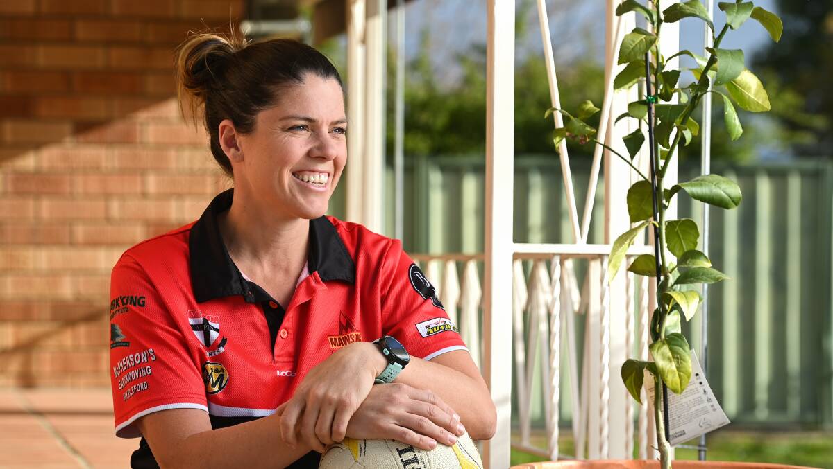 Myrtleford co-coach Tina Way recently celebrates 150 A-grade Ovens and Murray League netball games.