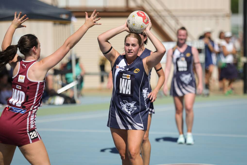Yarrawonga's Matilda Kennedy looks to pass against Wodonga during the first round back of the Ovens and Murray netball season. Picture by James Wiltshire
