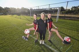 Wangaratta City FC's Arabella Cavicchiolo, 12, and Matilda Cavicchiolo, 14, with their mum and team manager Fleur Cavicchiolo. Picture by Mark Jesser.