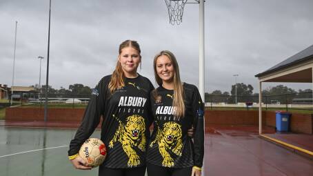 Sisters Sophia Dedourek, 14 and Brooke Dedourek, 20 recently made their A-grade netball debuts together for Albury Tigers. Picture by Mark Jesser