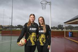 Sisters Sophia Dedourek, 14 and Brooke Dedourek, 20 recently made their A-grade netball debuts together for Albury Tigers. Picture by Mark Jesser