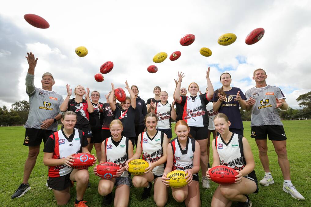 Almost 20 girls and women had a taste of Australian rules as part of a development day put on by AFL NSW and Brock-Burrum Saints football club. Picture by James Wiltshire