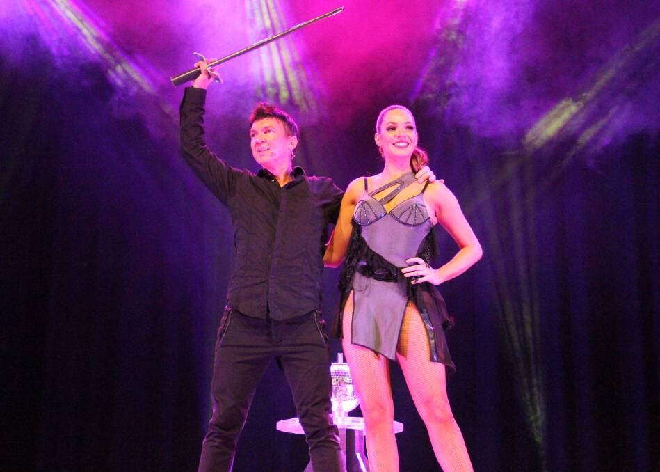 JUST MAGIC: Master illusionist Michael Boyd with dancer and assistant Elizabeth Kirby at Albury Entertainment Centre. Picture: DAVIS HARRIGAN