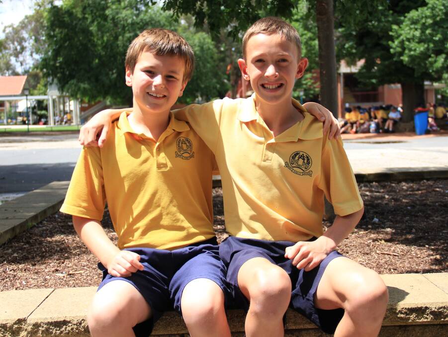 ACHIEVERS: Harry Cameron, 9, and Caleb Clemson, 10, can hold their heads high after recent academic and sport achievements at state level. Picture: DAVIS HARRIGAN