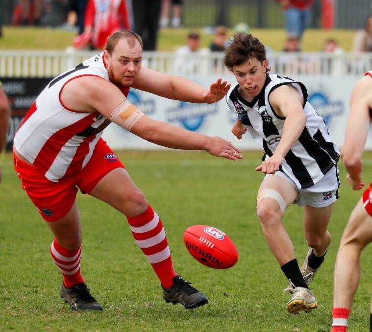 Cameron Terlich (right) playing for The Rock-Yerong Creek in last year's Farrer League reserve grade grand final against Charles Sturt University. Picture by Les Smith