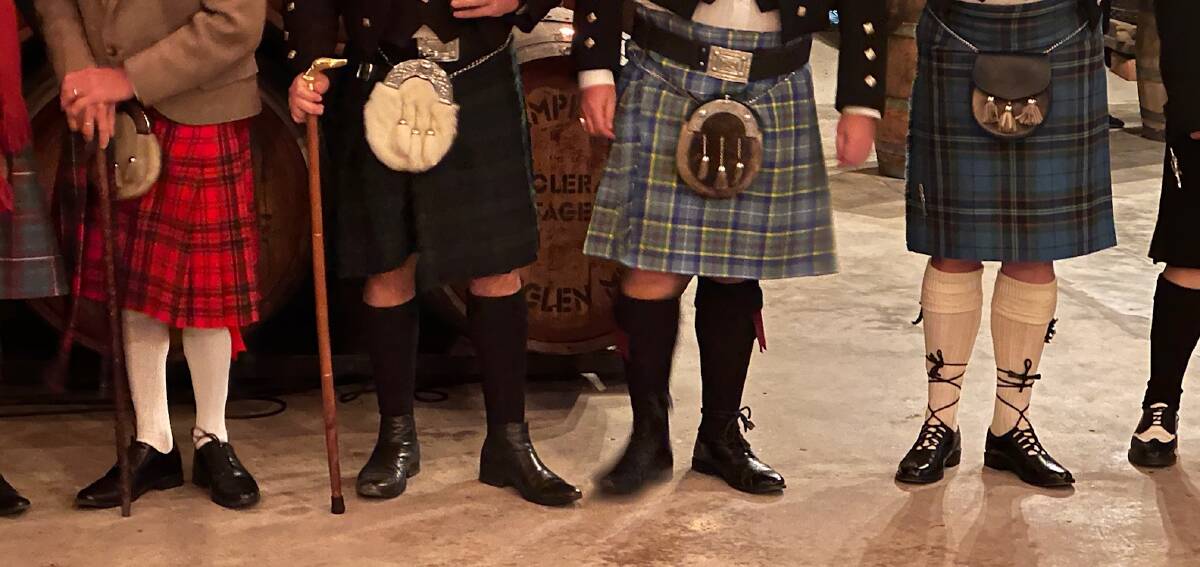 About a dozen men in kilts and a couple of women in Scottish garb line up at the Bobbie Burns Dinner at Campbell Wines on Saturday, May 18. Picture by John Chanter