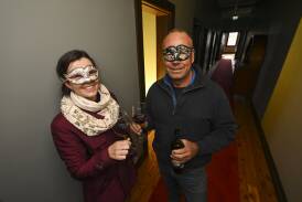 Natasha Killeen (Stanton & Killeen Wines) and Michael Chambers (Lake Moodemere Estate) toast the new Rutherglen festival, Dark Side of Wine, which opens with a masquerade ball at Rutherglen Convent on Friday, August 2. Picture by Mark Jesser