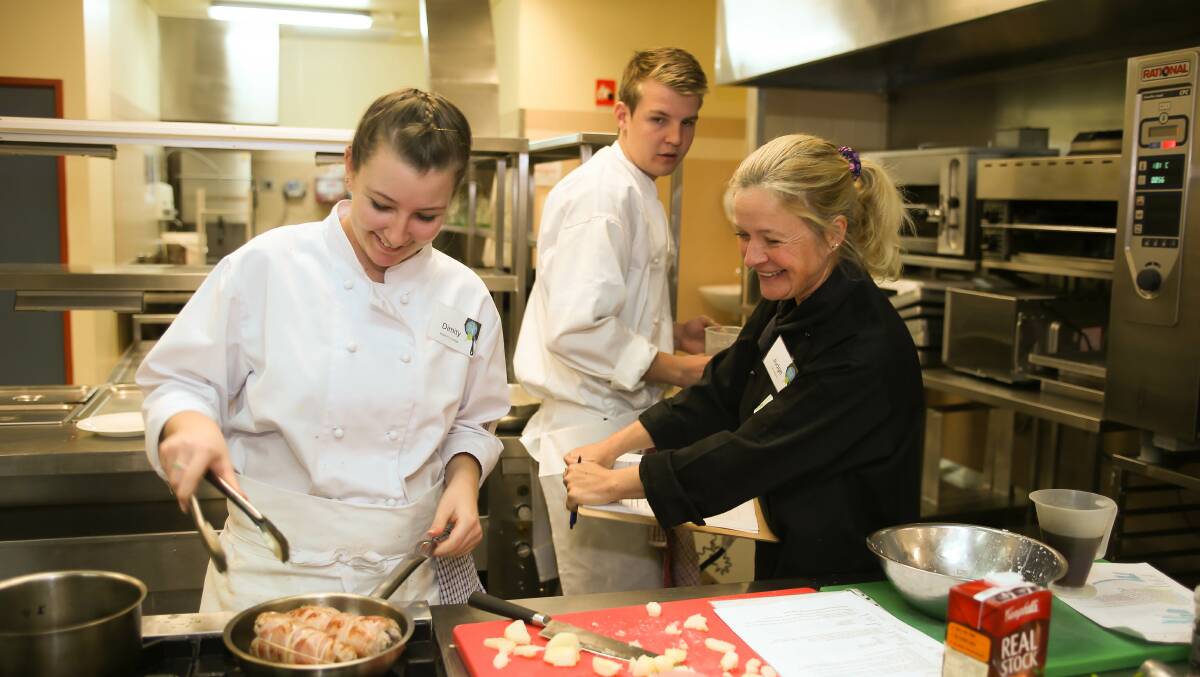 YES CHEF: Judge Kerry Mapley shares a joke with Bright P-12 College students Dimity Monshing and Jack Dalbosco. Picture: ELENOR TEDENBORG
