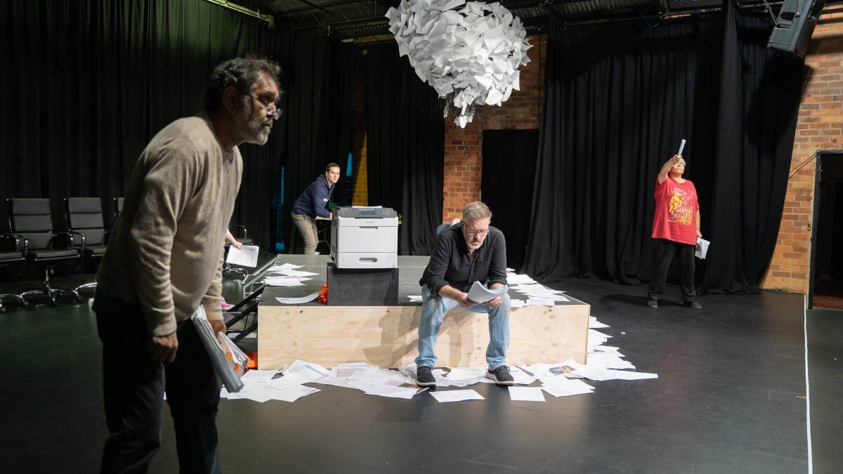 Billy McPherson, foreground, rehearses for the upcoming premiere of Unprecedented.