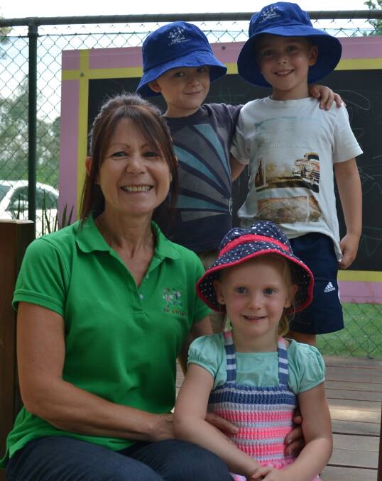 PARTY PLAN: Albury Preschool teacher Elle Whittaker with Zarah Wright, Zye French and Oliver Marcus, all 4, celebrate the preschool's 70th birthday. Pictures: JODIE BRUTON