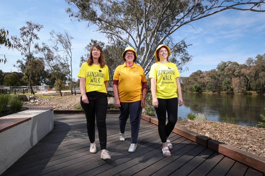 Albury Mayor Kylie King, Albury Wodonga Regional Cancer Centre Trust Fund board member Di Thomas and Sunshine Walk participant Simone McLees. Picture by James Wiltshire