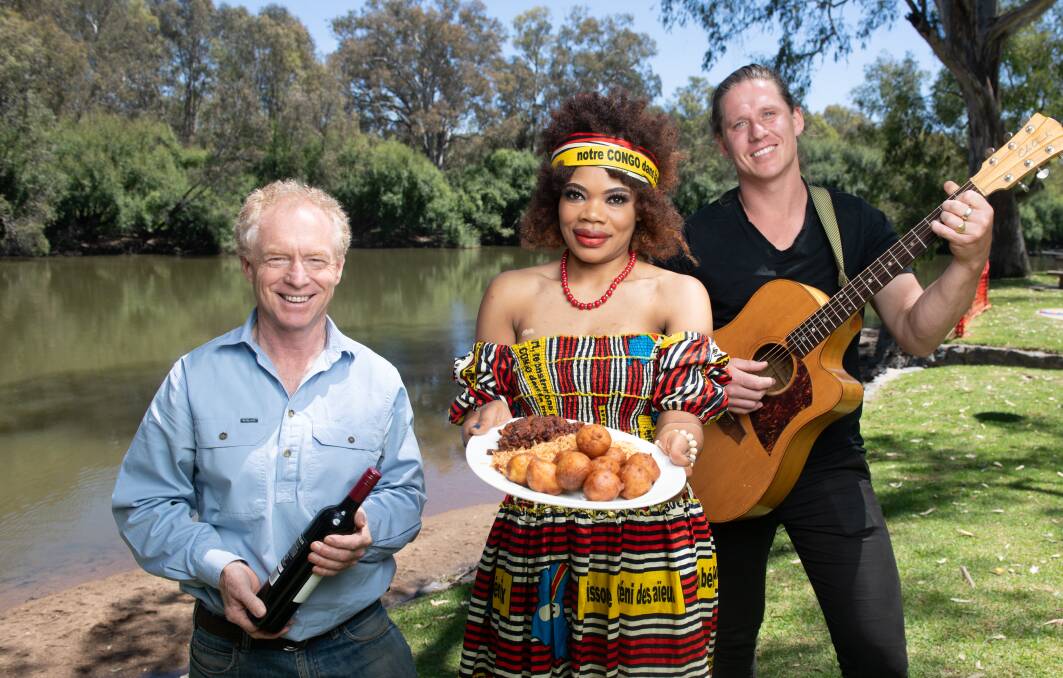 Rotarian Gordon Shaw, African cook Edwige Kirimwani and musician Patrick Thurtell welcome people to the Beats & Eats festival at Noreuil Park on Saturday, February 3. Picture by Tara Trewhella