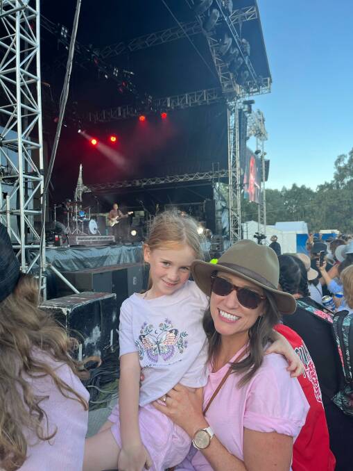 Killara schoolgirl Lucy Kiely, 7, with her mum Mary Kiely, were front and centre for Red Hot Summer Tour at Gateway Lakes in Wodonga on Saturday night.