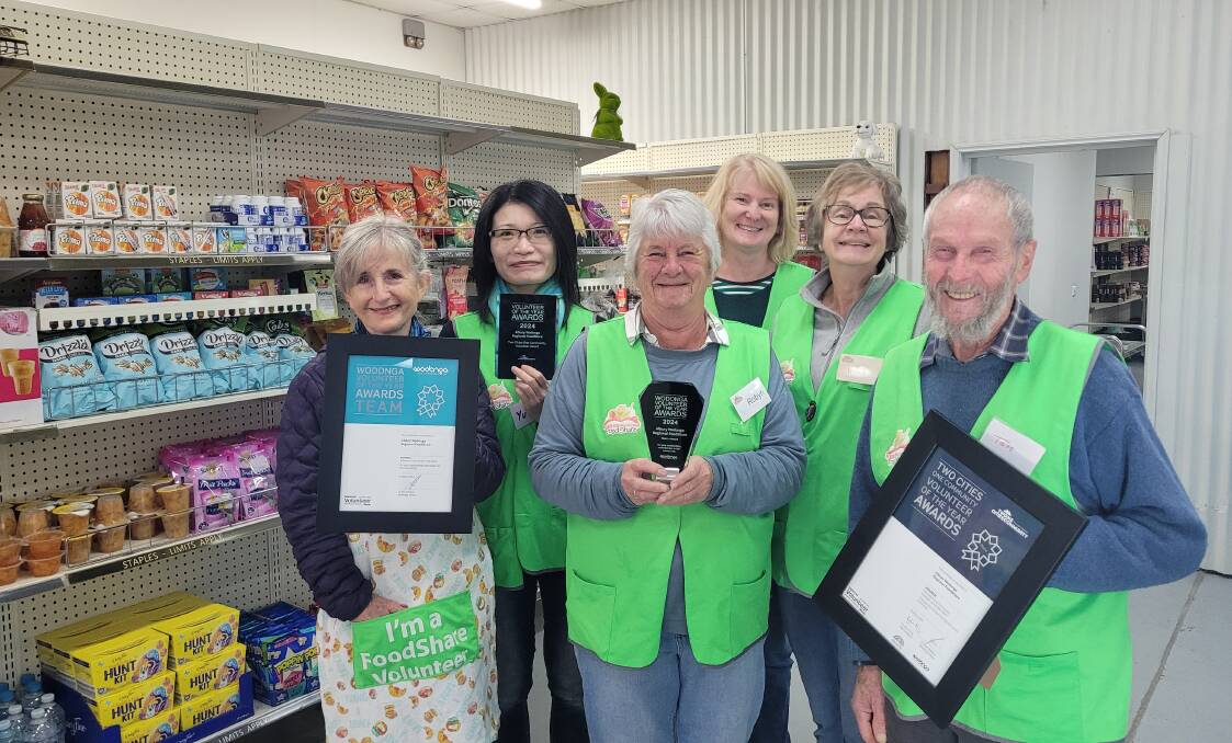 Albury Wodonga Regional FoodShare Community Pantry volunteers (front) Trish Trevaskis, Robyn Evans, Tom Boyd, (back) Yuching Chang, Lisa Murtagh and Robyn Phelps celebrate their Wodonga volunteer awards on Friday, May 24. Picture supplied