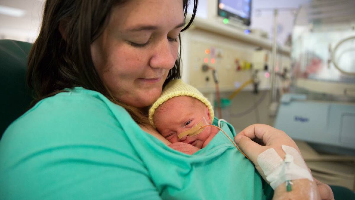 TWO OF US: Laura Shanahan soaks up a tender moment with her newborn daughter Savannah in the Special Care Nursery at Wodonga Hospital. Picture: ANDREW LEE