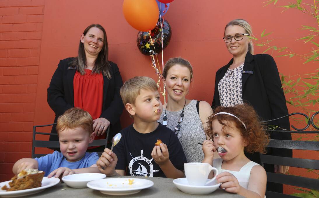 REAL DEAL: Regional Deals founders Kath Hopkins and Cath McGrath with Abby Pasqualotto and her children Christian, 5, Sebastian and Amelia, both 3, who were the first to claim a deal at Zilch. Picture: ELENOR TEDENBORG