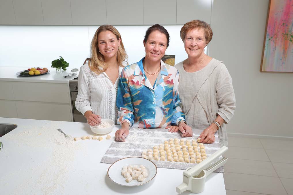 Albury's Jenny Stern (centre) will share her family's gnocchi recipe, enjoyed by her daughter Julia Stern and mother Carolyn Butko, as part of the goods and services auction at the St David's Uniting Church fair on Saturday, November 11. Picture by James Wiltshire