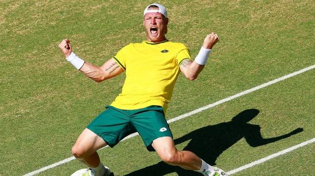 Albury's Sam Groth celebrates his Davis Cup victory over Mikhail Kukushkin in Darwin. 