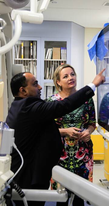Work can continue: Doctor Jithendra Somaratne with Health Minister Sussan Ley at Albury Wodonga Private Hospital earlier this year.