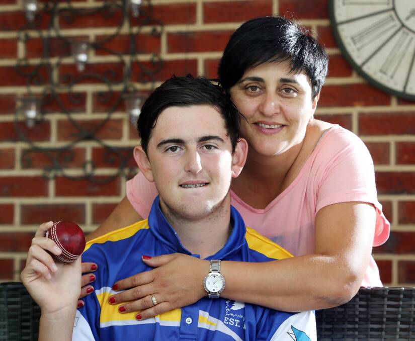 Mother's love: Nadia Dinneen (right) will be watching when her son Mitchell returns to competitive cricket.