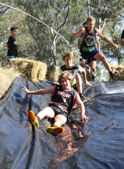 GETTING MUDDY: Competitors aged from four-years-old to over 70 tackled the five and 2.5-kilometre courses in the Milawa Oxley Mud Run.