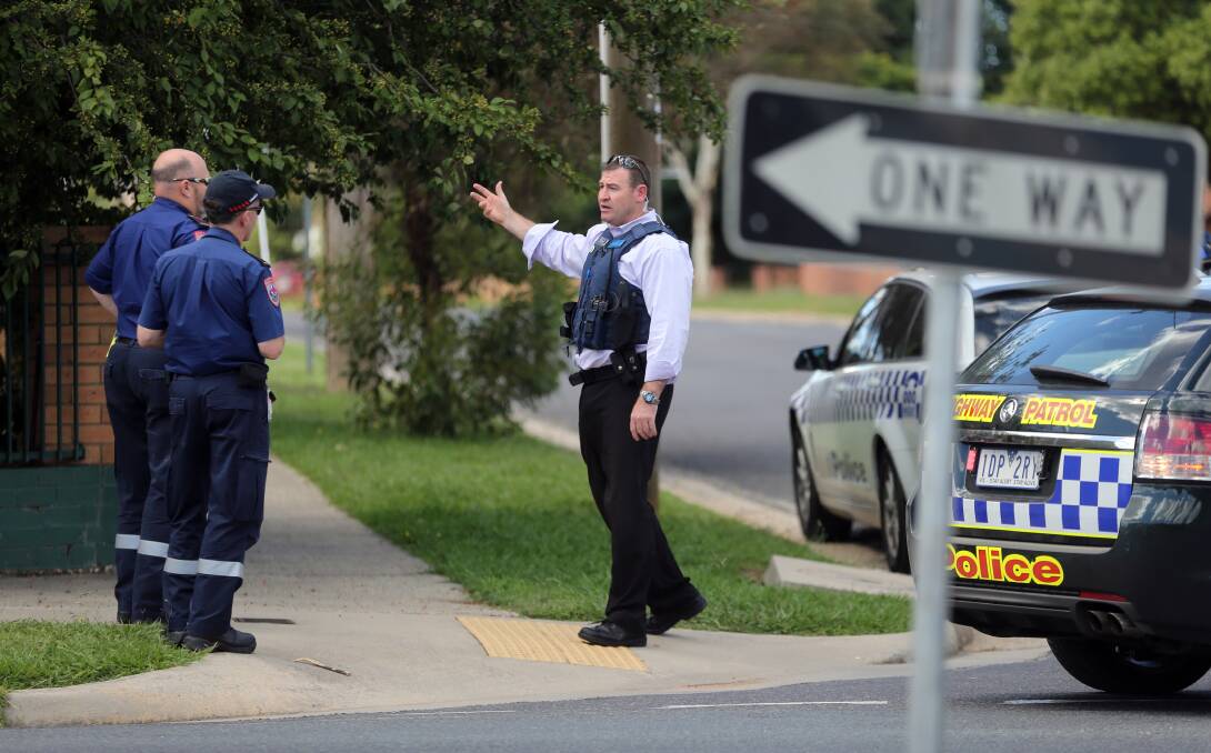 WASTE OF TIME: Wodonga police and emergency services shut down Morrison Street in January after reports of an incident involving a shotgun.
