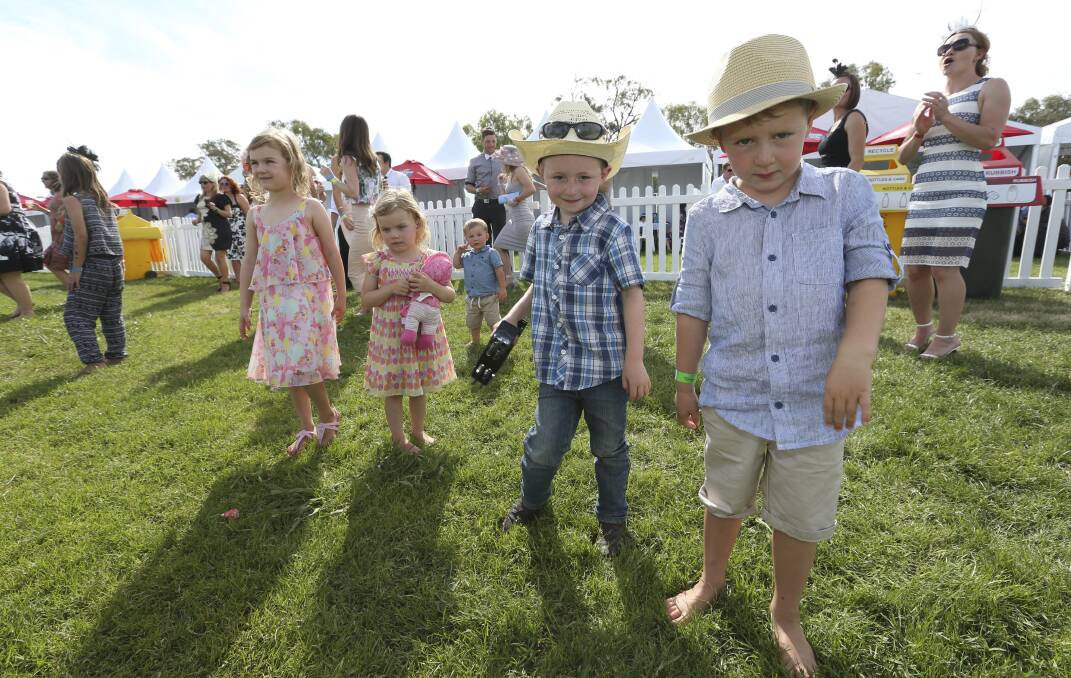 ROCKING OUT: Jack Hourigan, 5, and Lewis Neely, 5, from Wangaratta had some fun on the grass dancefloor in the marquee section. Picture: ELENOR TEDENBORG