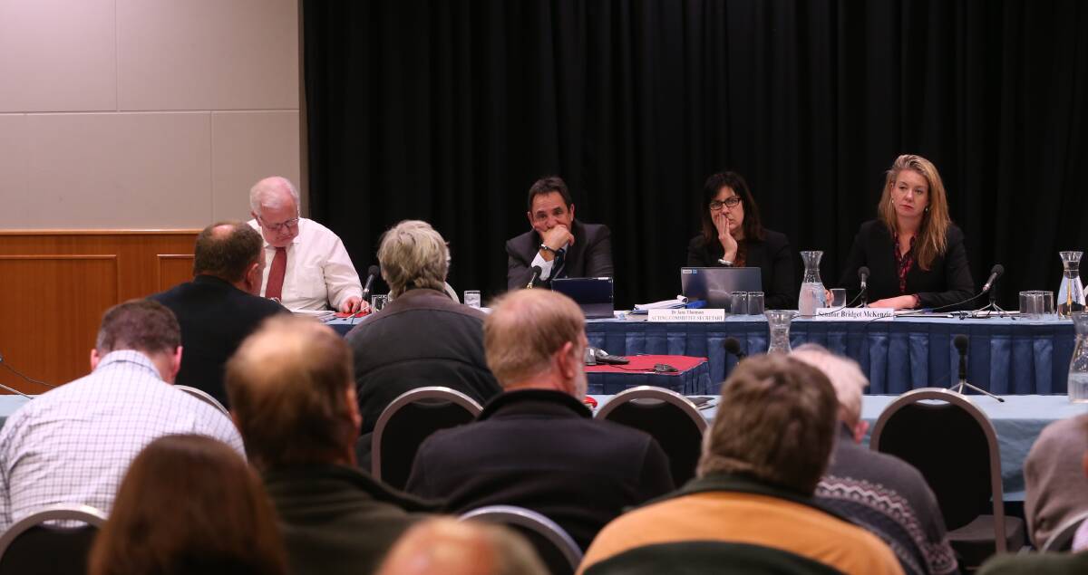 MAKING SENSE: Senator Glenn Sterle, centre, and the panel listen to North East beef producer Maureen Cottam during Wednesday's hearing in Albury. Picture: JAMES WILTSHIRE