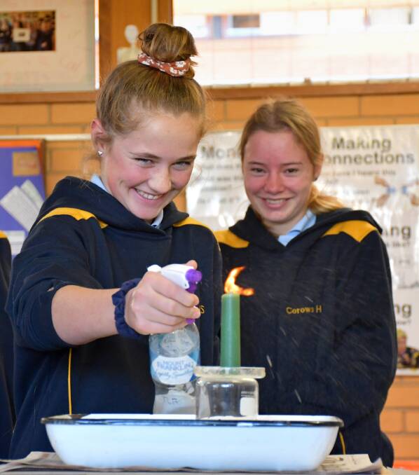 SAY CHEESE: One of the award winning pictures taken by Corowa High School. Year 7 students Tamir Richardson and Clodagh Blain engaging in a STEM experiment.