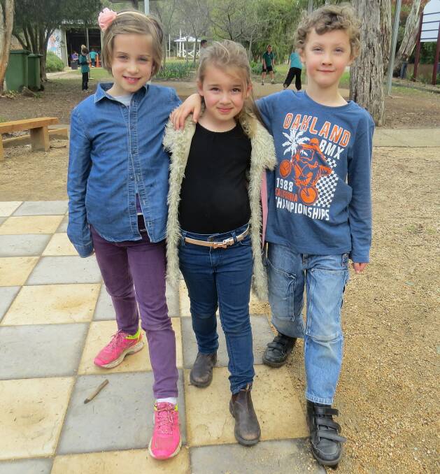JEANS FOR GENES: Osbornes Flat Primary School students Albany Weeks, 9, Willow Ablett, 5, and Nat Locke, 7, are excited to raise money. Picture: JAN CASHEN