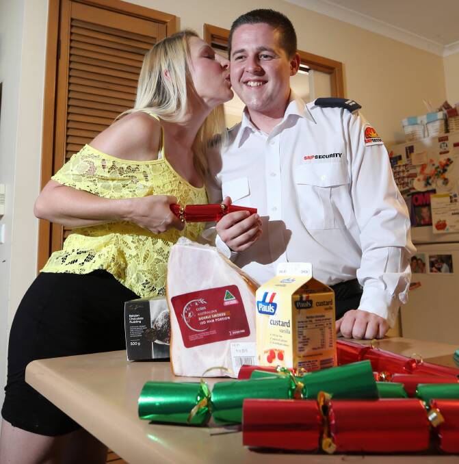 Christmas crusade: Mathew Winchester is again on a one-man mission to deliver festive cheer to people in need this Christmas. He is pictured with a very grateful Dee Sellers, of Wodonga, who received a hamper last year.