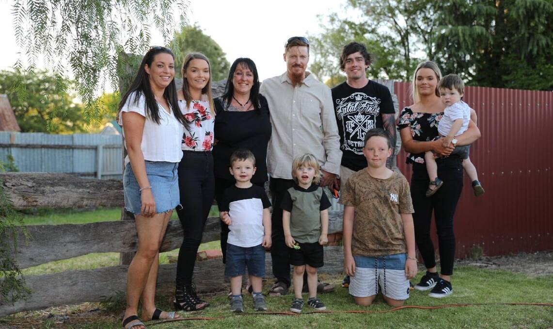 Emma and Christine with Joanne and Adrian Smith, Michael and Isabel (with Corey) and (at front) Hunter, Jackson and the couple's son William at Joanne's 50th birthday.