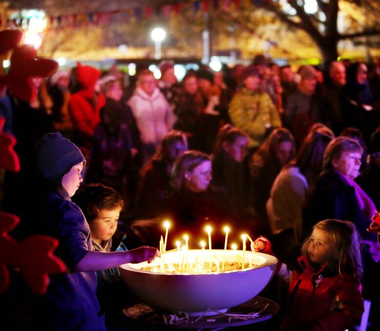 Flame of hope: Close to 1000 people gathered for this year's Winter Solstice for Survivors of Suicide community event at Albury's QEII Square to shine a light on the darkness of suicide.