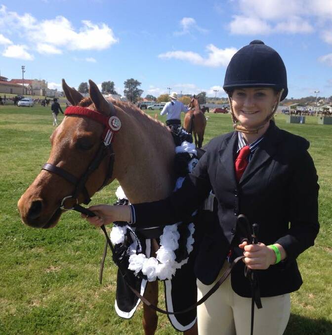 CHAMPIONS: Sophie Anderson with Palm Park Royal Command, who is owned by Corowa's Cherie Mills, scooped the ribbon pool at Parkes Agricultural Show last week.