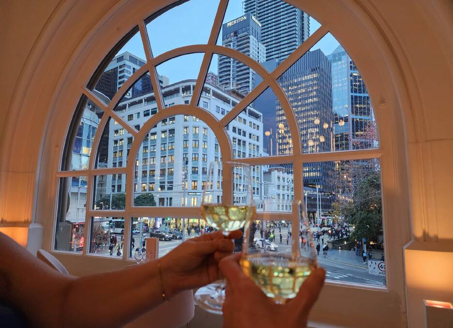 Enjoying some bubbles at Reign bar at the QVB, opposite Sydney Town Hall. Picture by Desiree Savage