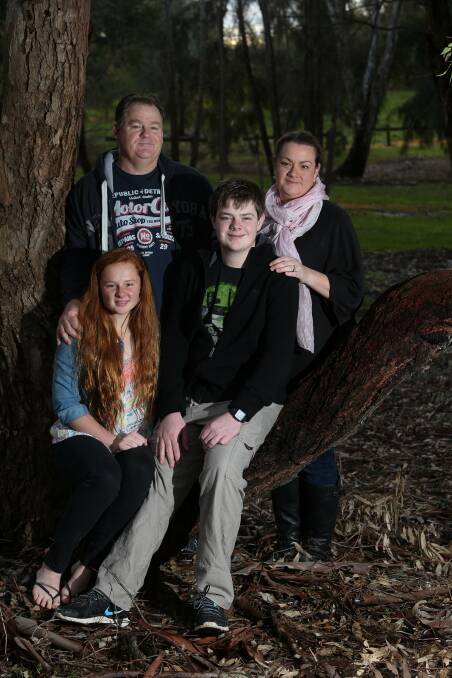 APPRECIATION: Doug and Sam Oswald with children Grace, 15, and Mack, 14, are thankful to the emergency services. Picture: ELENOR TEDENBORG 