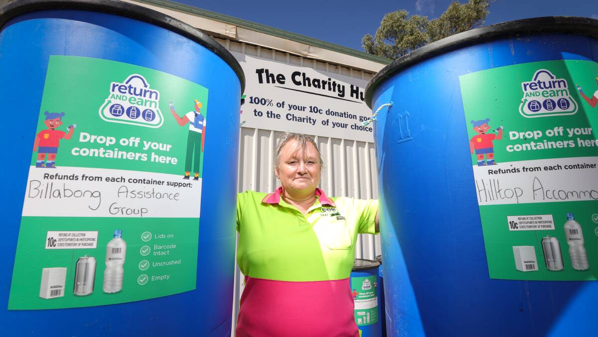 Heather Groesch with two of several tubs at her business which are designated for particular charities. Picture by James Wiltshire