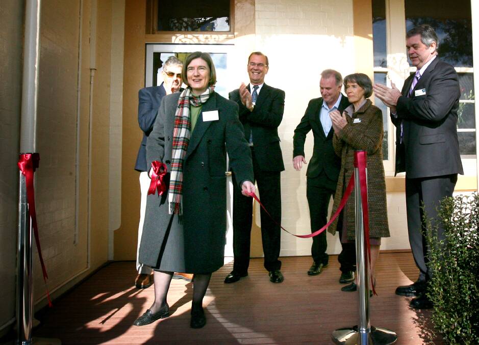 Then Albury mayor Alice Glachan opens the visitor information centre at the former stationmaster's house in July 2010 with fellow councillors watching on.
