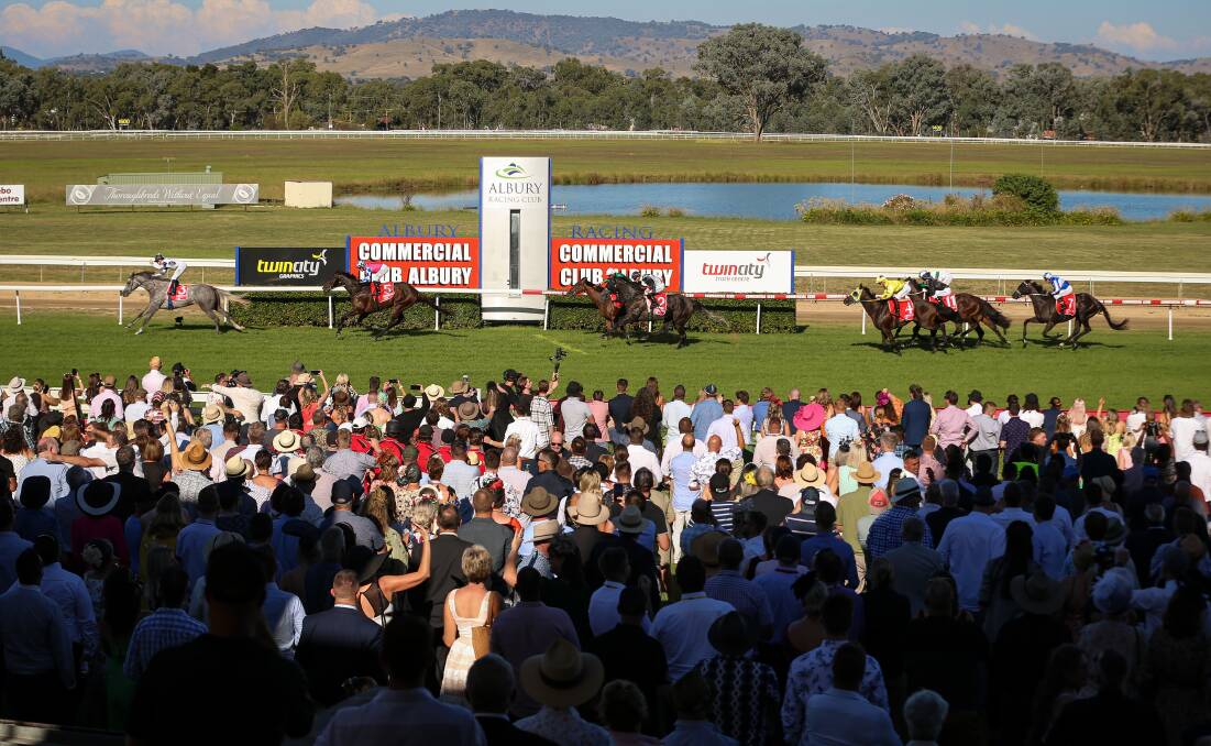The horses cross the line in the 2022 Albury Gold Cup, which drew thousands to the track. Picture by James Wiltshire