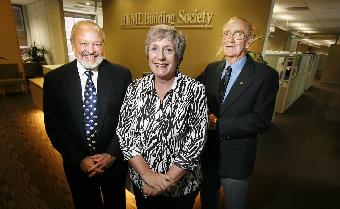 Les Boyes (right) at the time he stepped down as director of the Hume Building Society and Stuart Gilchrist and Denise Osborne joined the board.