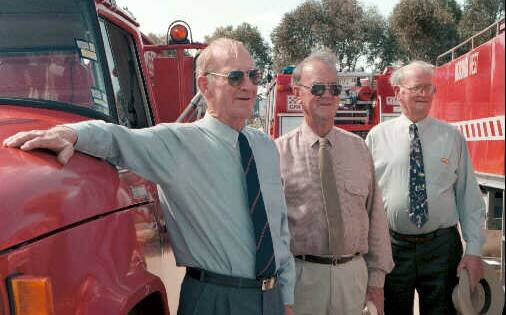 Les Boyes with Bill Richardson and George Coyle in 1997 when they received service medals for their commitment to the Wodonga West CFA brigade.