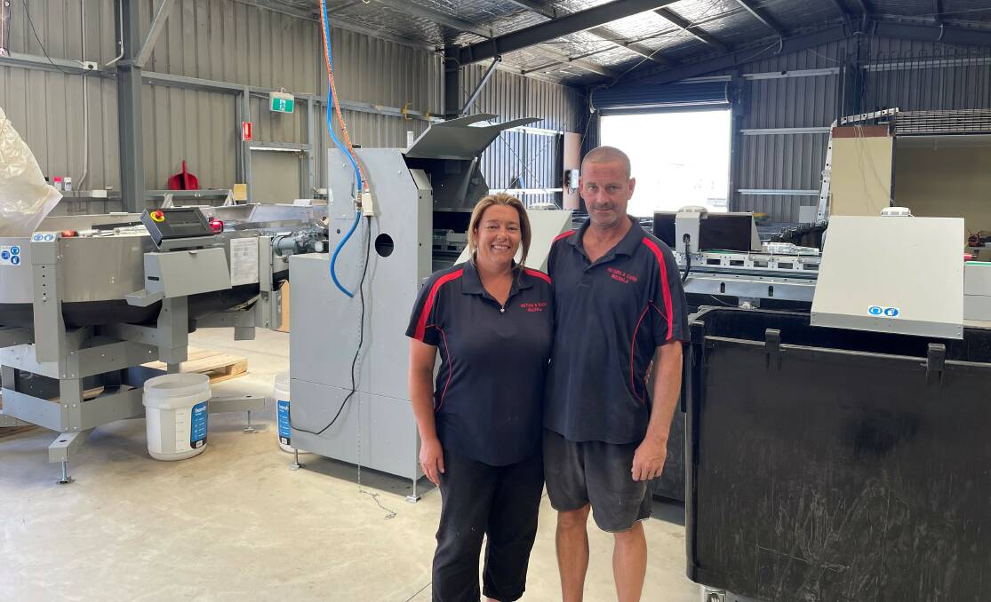 Monica and Rocky Leith inside their new automated can and bottle return depot at Mulwala. Picture supplied