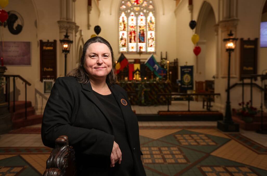 Michelle Evans at St Matthew's Anglican Church after giving her address to the congregation. The sanctuary was decorated with Indigenous flags and yellow, black and red flags to mark NAIDOC Week. Picture by James Wiltshire