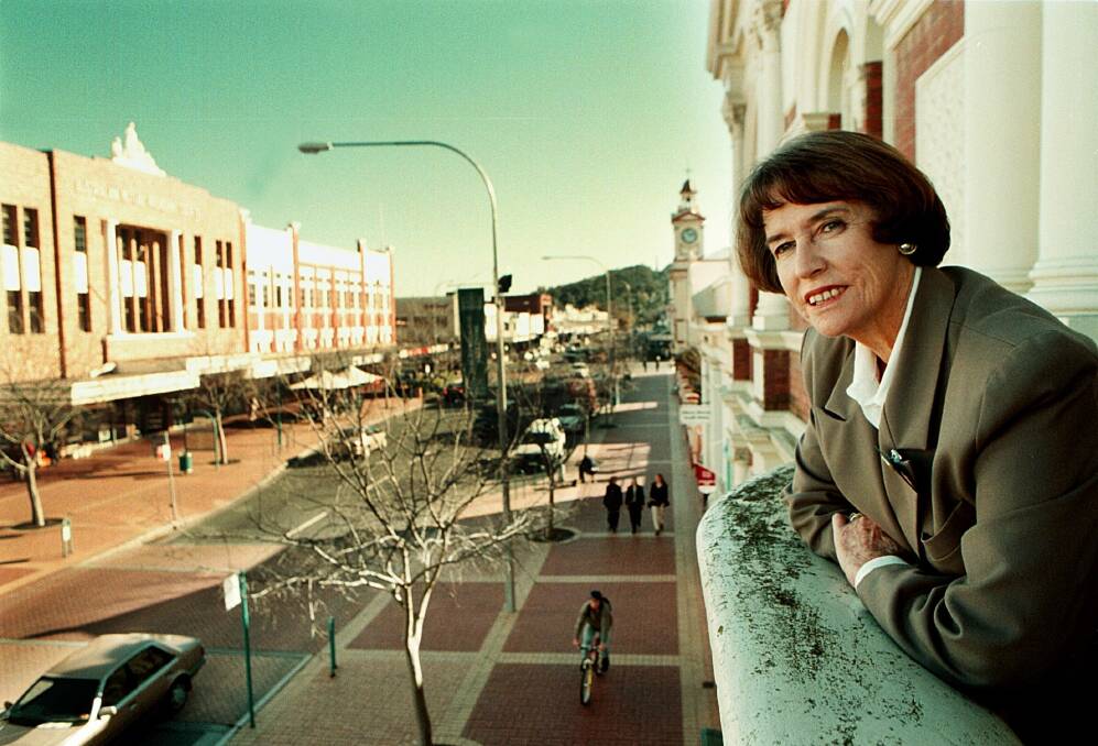 Patricia Gould as mayor in 1999 looks out over Dean Street from the then Albury art gallery which was housed in a building that once was the city's town hall. Her first meetings as a councillor took place in the edifice before the municipal headquarters moved to Kiewa Street in 1976.