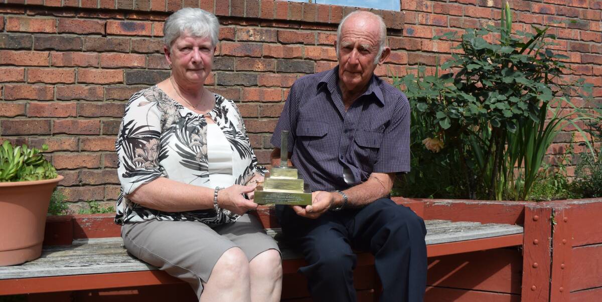 Lost treasure: Glenda Macdonald and Austin Elliot with the brass memorial which honours World War I digger Harold Elliot who was killed in action in France in 1918. The piece had been on a display at a Melbourne RSL.