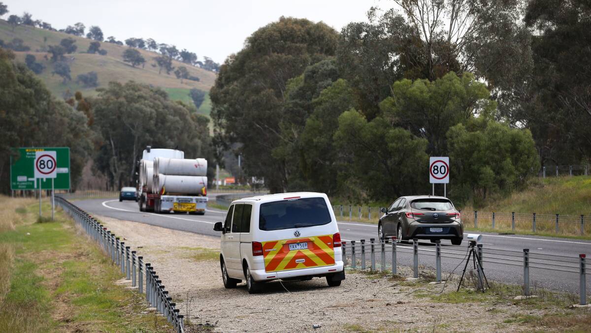 The 80km/h signs on the Hume Freeway as motorists approach the McKoy Street intersection in west Wodonga. This photograph was taken during an operation involving the detection of number plates.